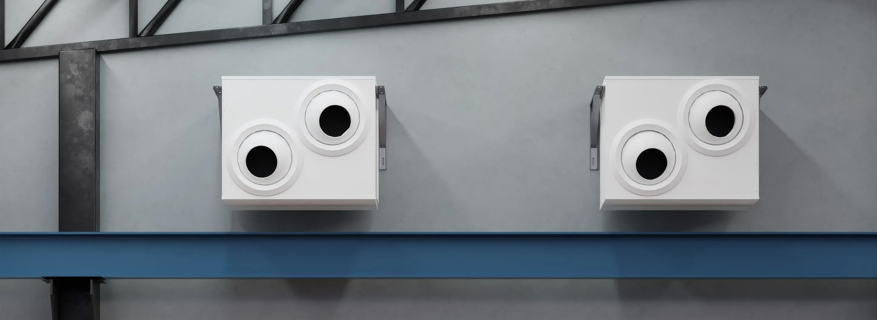 Two OKKI units above a steel beam in an industrial hall