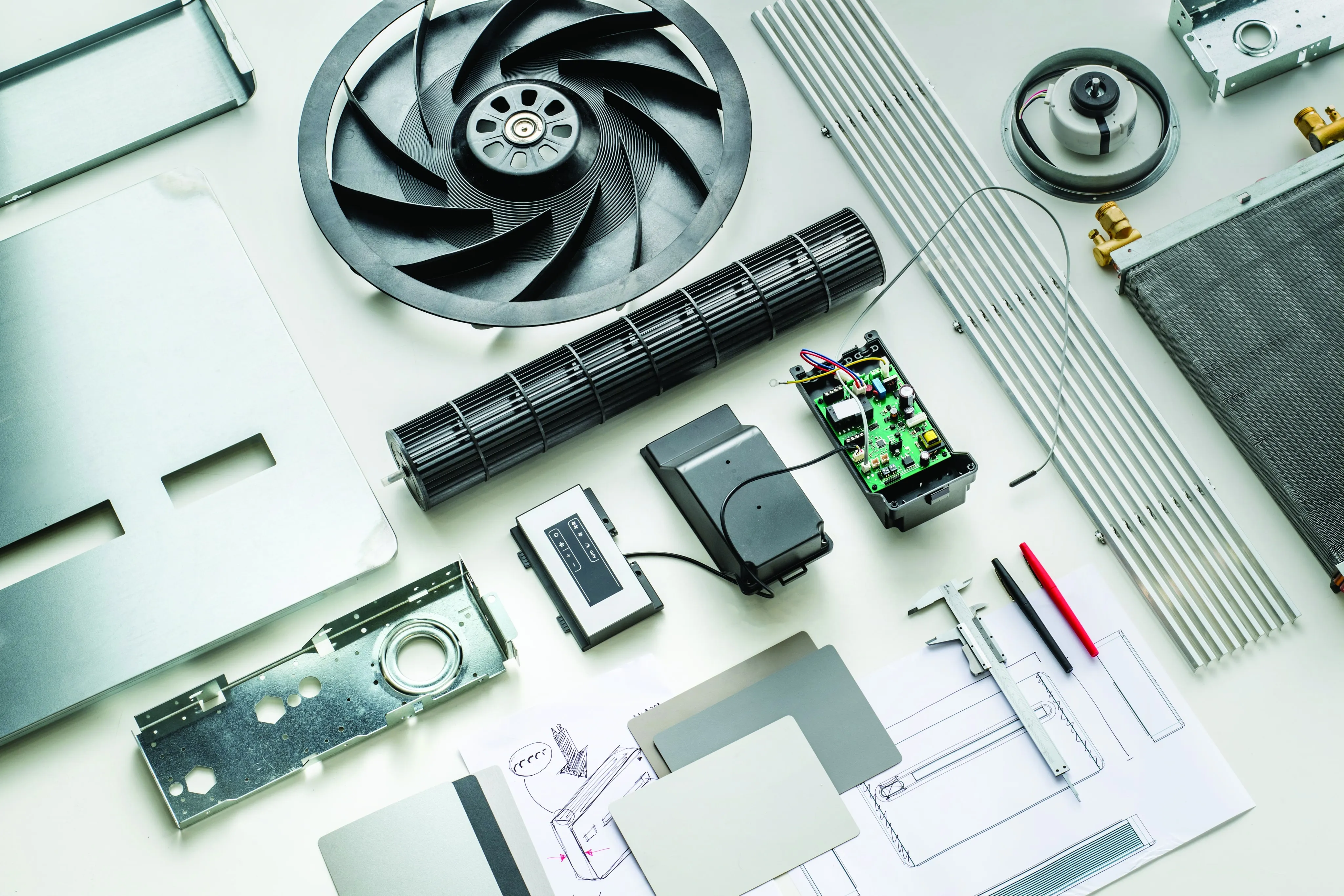 Heat pump components laid out on a workbench