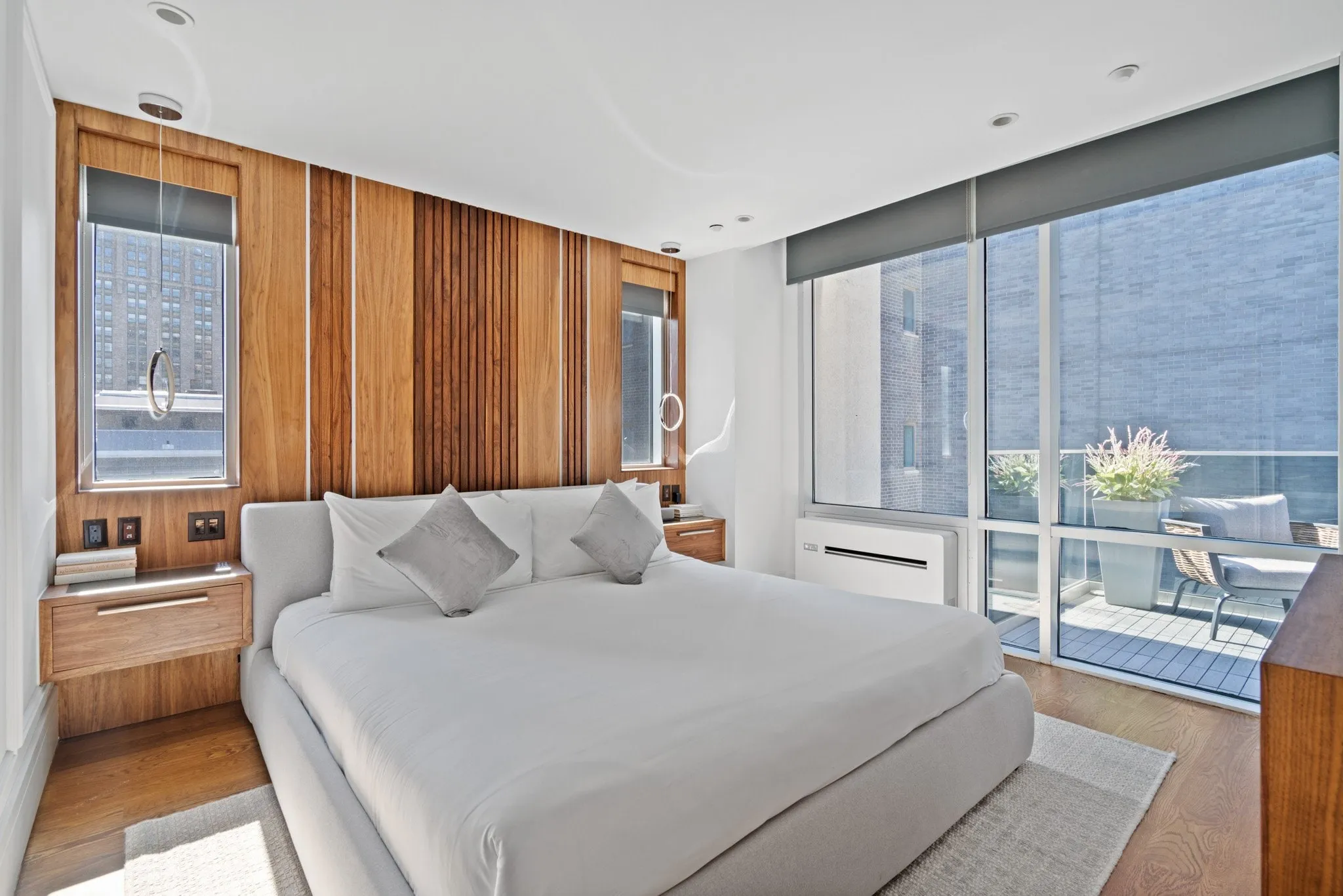 AIO Wall Mounted unit on the wall of a bright bedroom